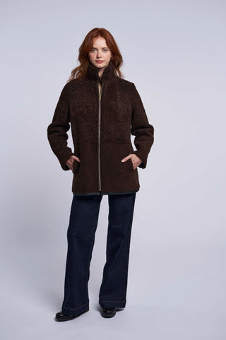 243  Genuine shearling reversible topper  $500     just 1 S sorry no additional discounts